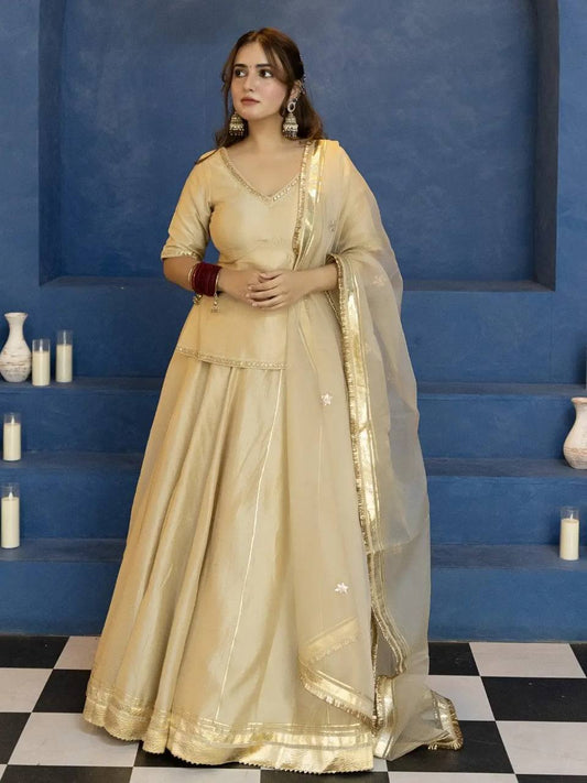 Champagne Beige Vichitra Silk Lehenga Suit with Gotta Patti Border & Organza Dupatta