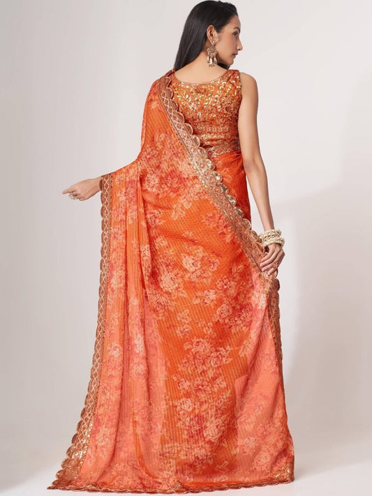 Vibrant Orange Floral organza Saree with Golden Zari Embroidery