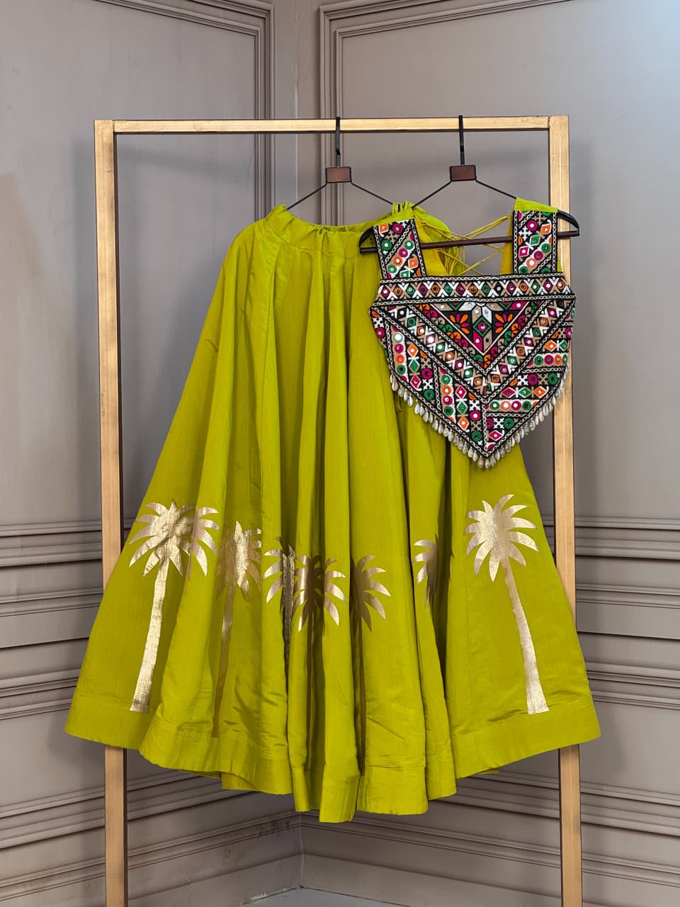 Coconut Gota Work Lehenga with Kutchi Gamthi Embroidered Blouse