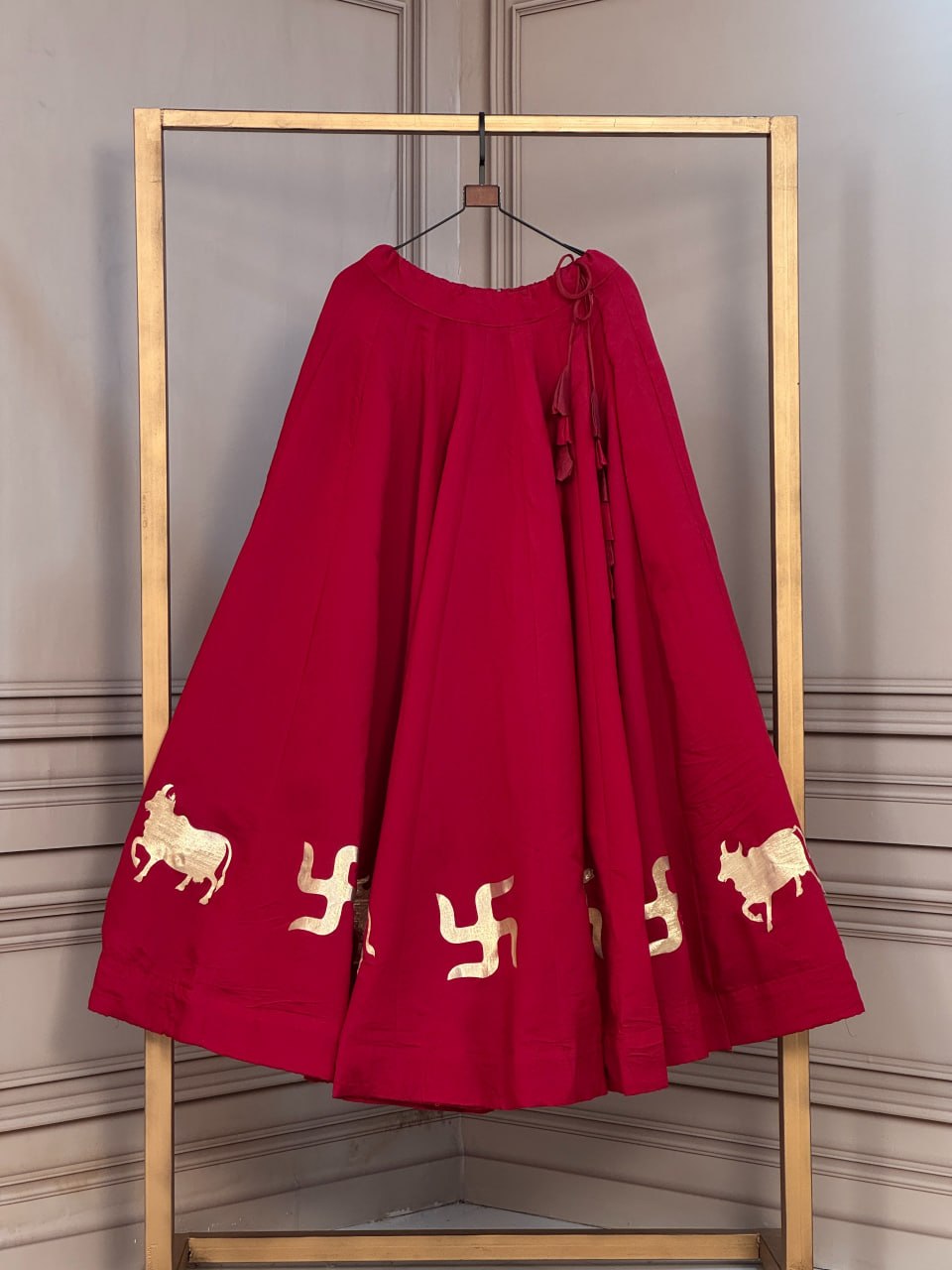 Roman Silk Cow & Swastik Gota Work Lehenga