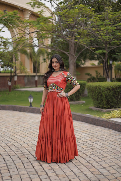 Rust Kutchi Gamthi Thread Embroidered & Mirror Work Rayon Anarkali Gown with Moti Kodi Lace