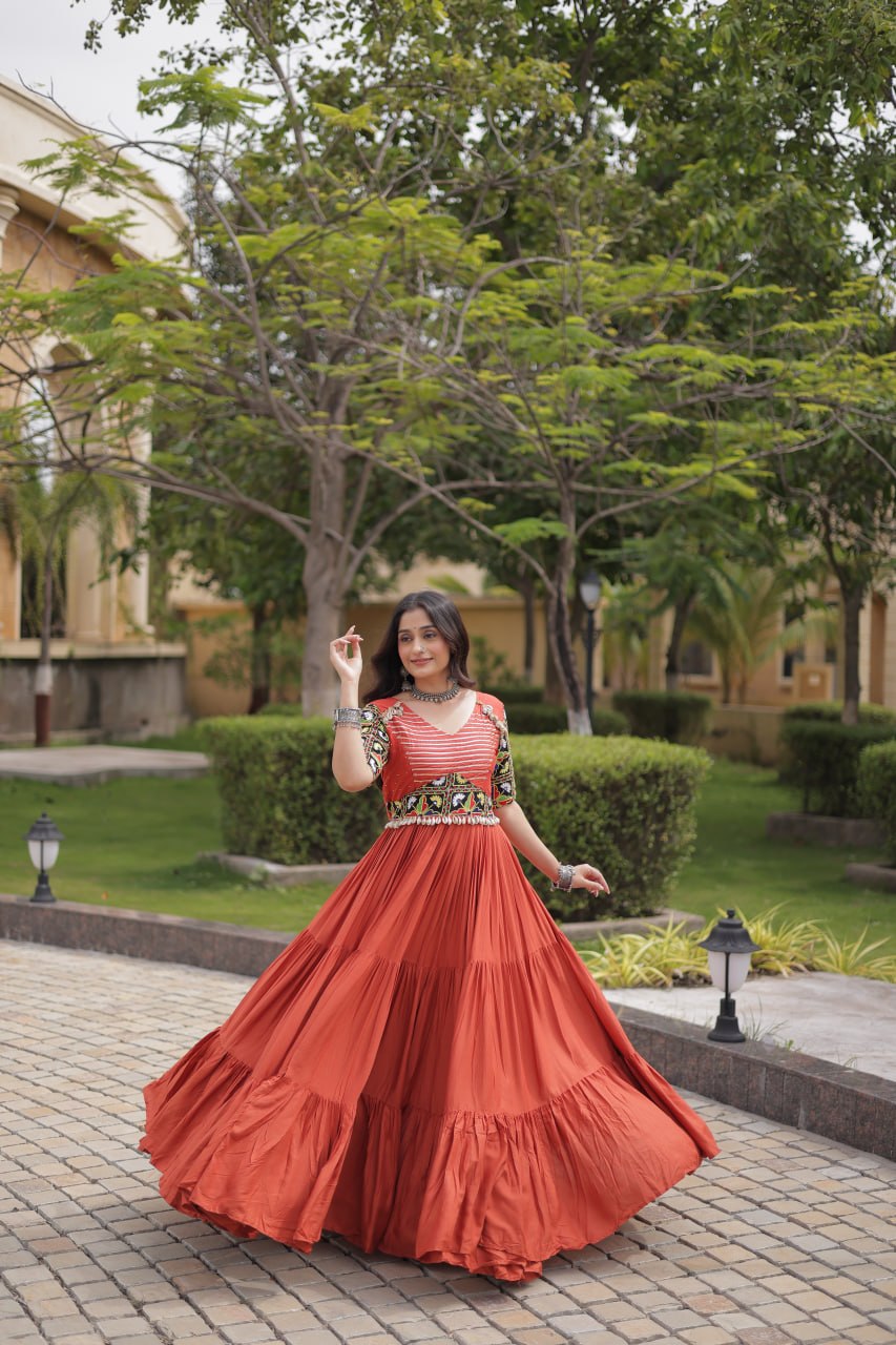 Rust Kutchi Gamthi Thread Embroidered & Mirror Work Rayon Anarkali Gown with Moti Kodi Lace