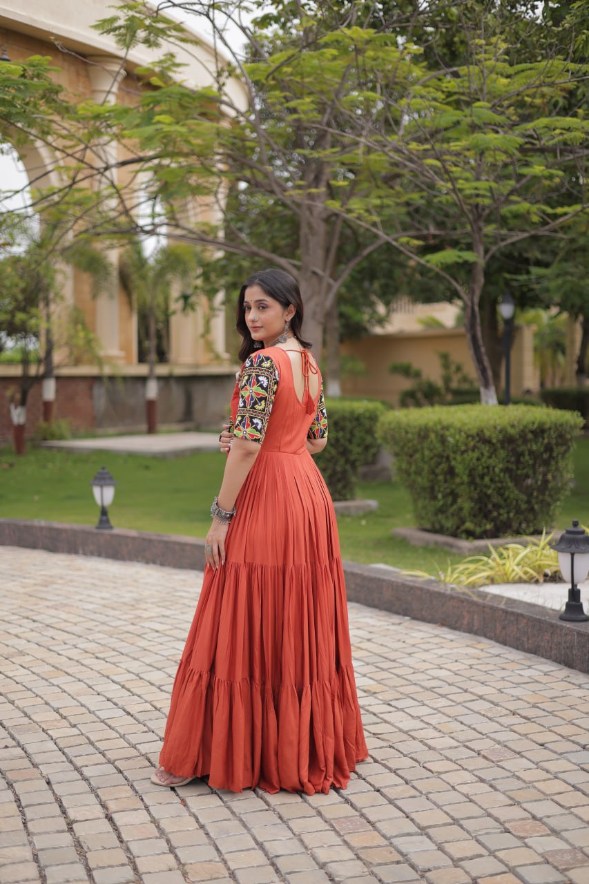 Rust Kutchi Gamthi Thread Embroidered & Mirror Work Rayon Anarkali Gown with Moti Kodi Lace