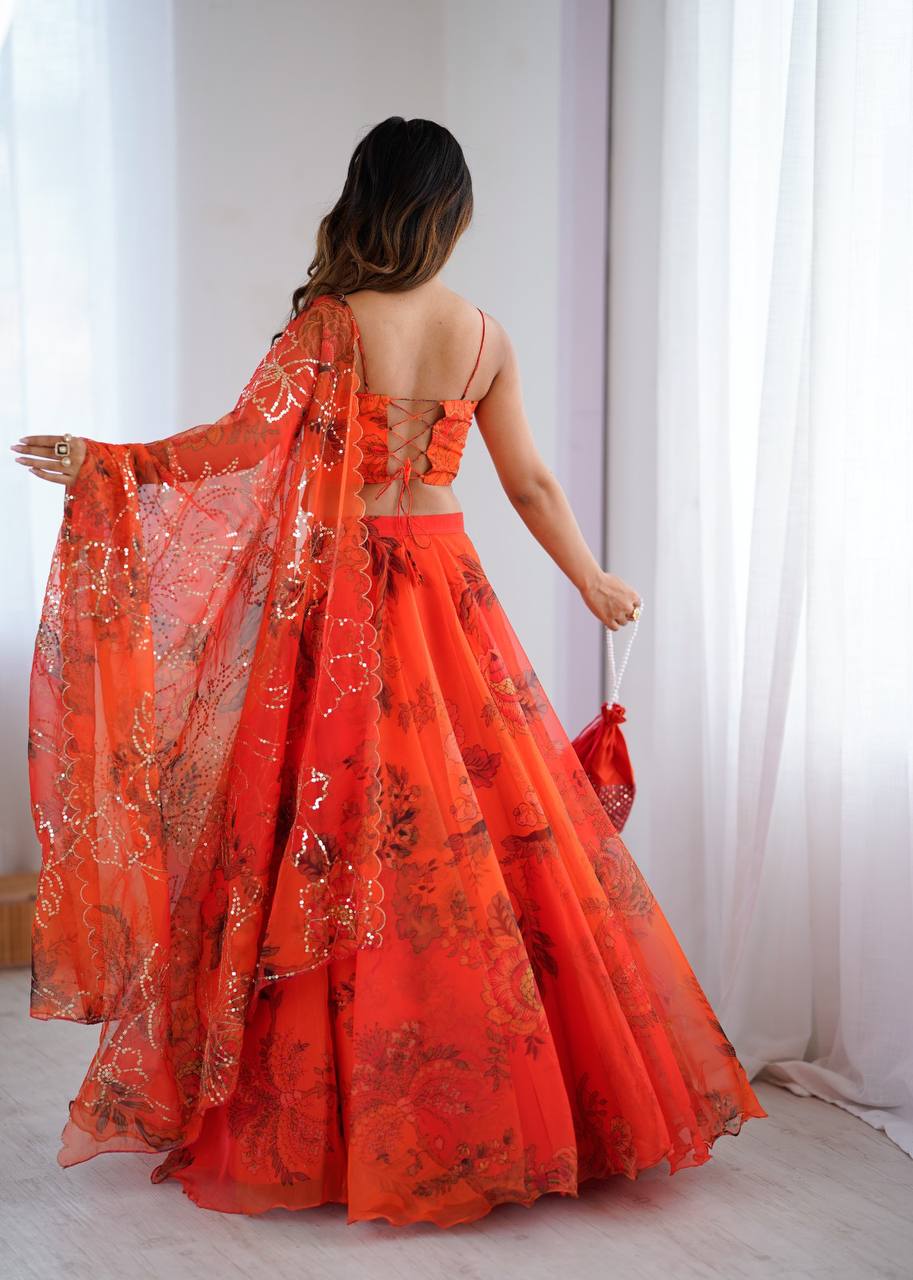 Orange Organza Corset Blouse Lehenga with Dupatta and Potli Bag