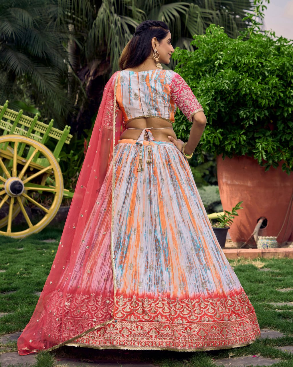 Multicolor Tie-Dye Lehenga with Pink Net Dupatta and Embroidered Border