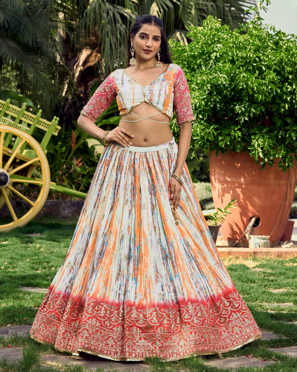Multicolor Tie-Dye Lehenga with Pink Net Dupatta and Embroidered Border