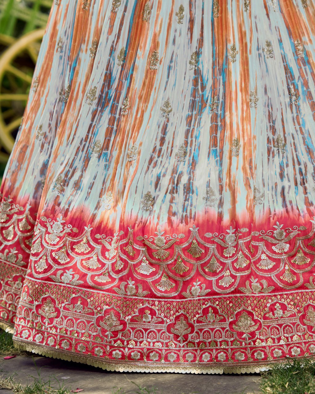 Multicolor Tie-Dye Lehenga with Pink Net Dupatta and Embroidered Border