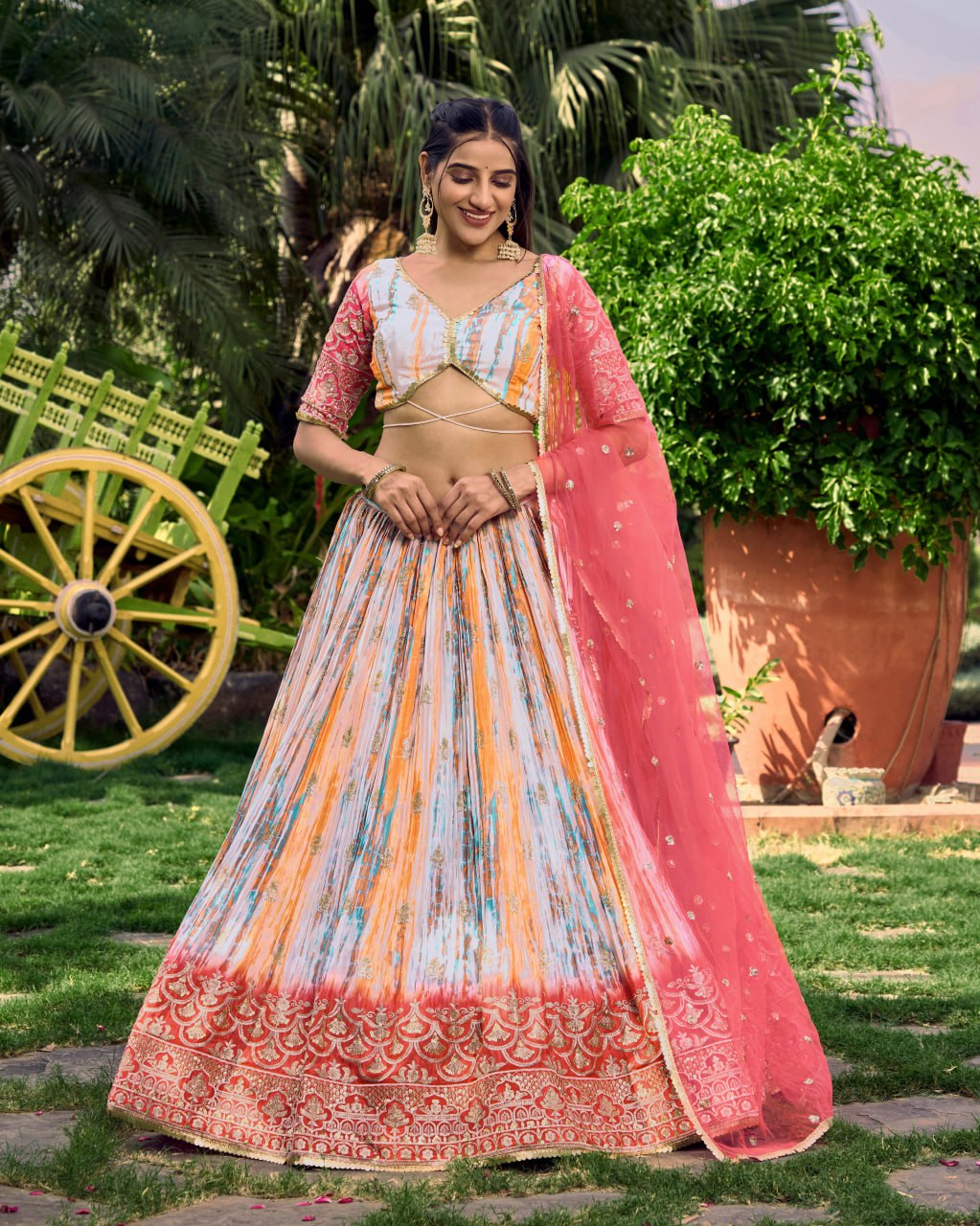 Multicolor Tie-Dye Lehenga with Pink Net Dupatta and Embroidered Border
