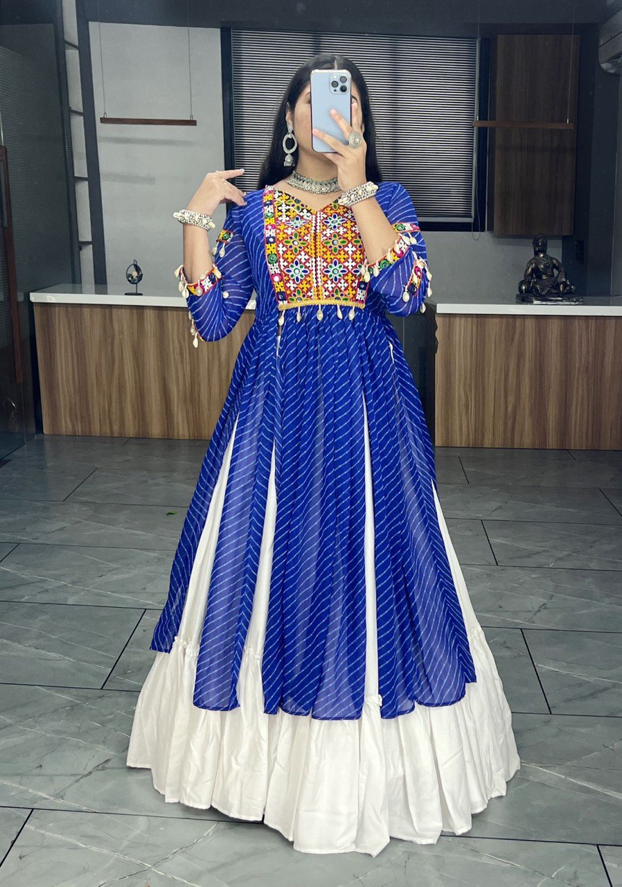garba dress design Indian Gujarati culture, especially Garba, has a unique charm. The colorful dresses adorned with intricate Gamthi and Kutchi work evoke a distinct feeling. When you wear these vibrant, intricately-designed Gujarati garments, you're