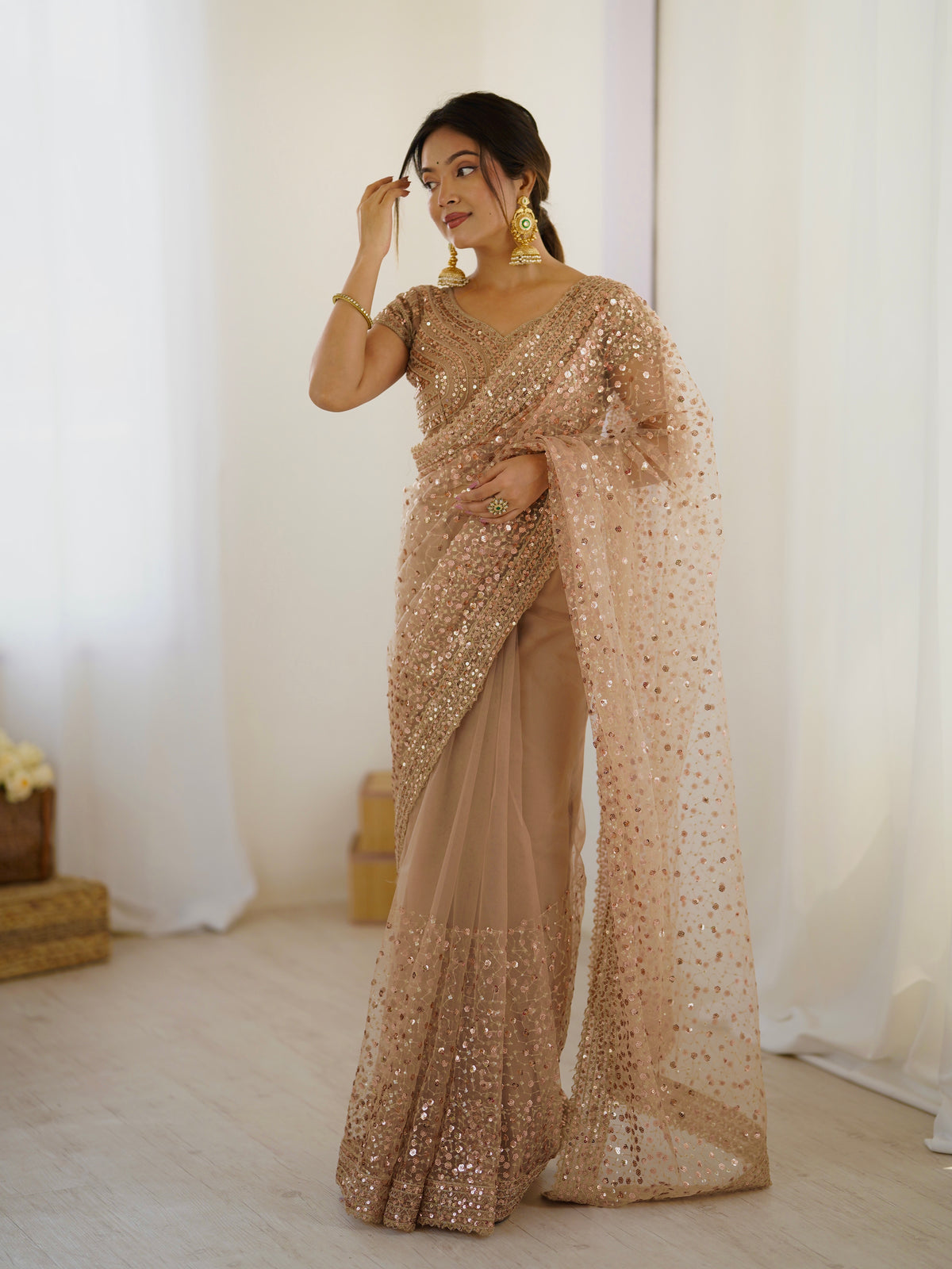 Elegant Partywear Nude Sequin Net Saree for Reception