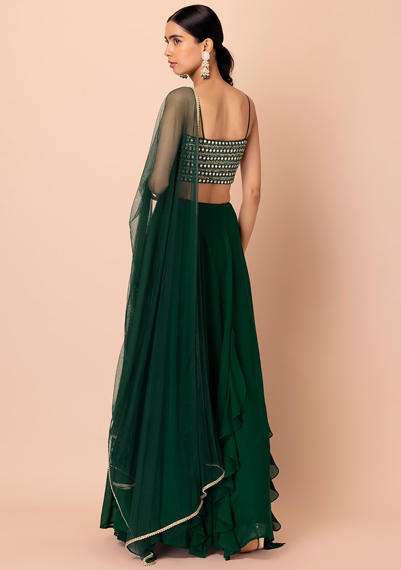 Shop green ruffle lehenga with mirror work crop top and net dupatta