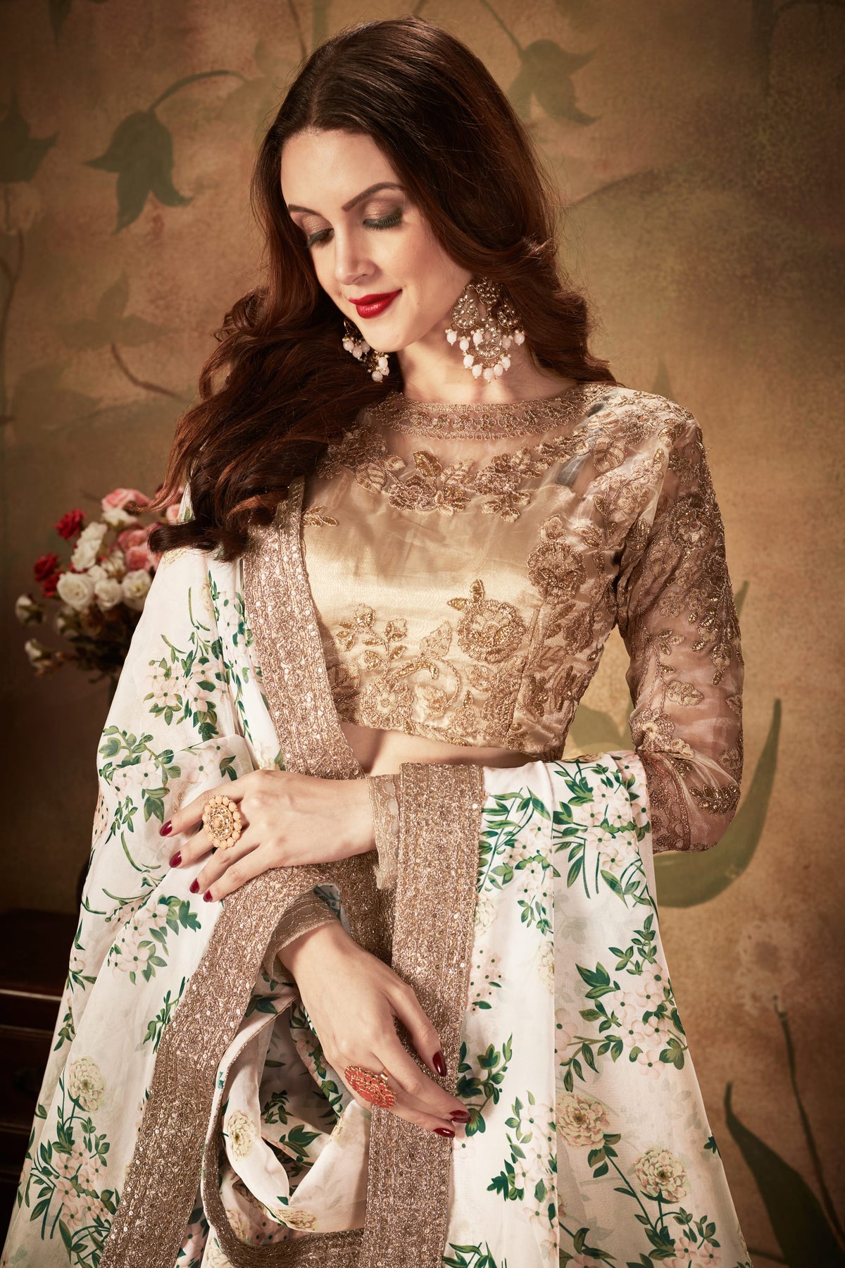 White Floral Lehenga Choli with Embroidered Golden Blouse