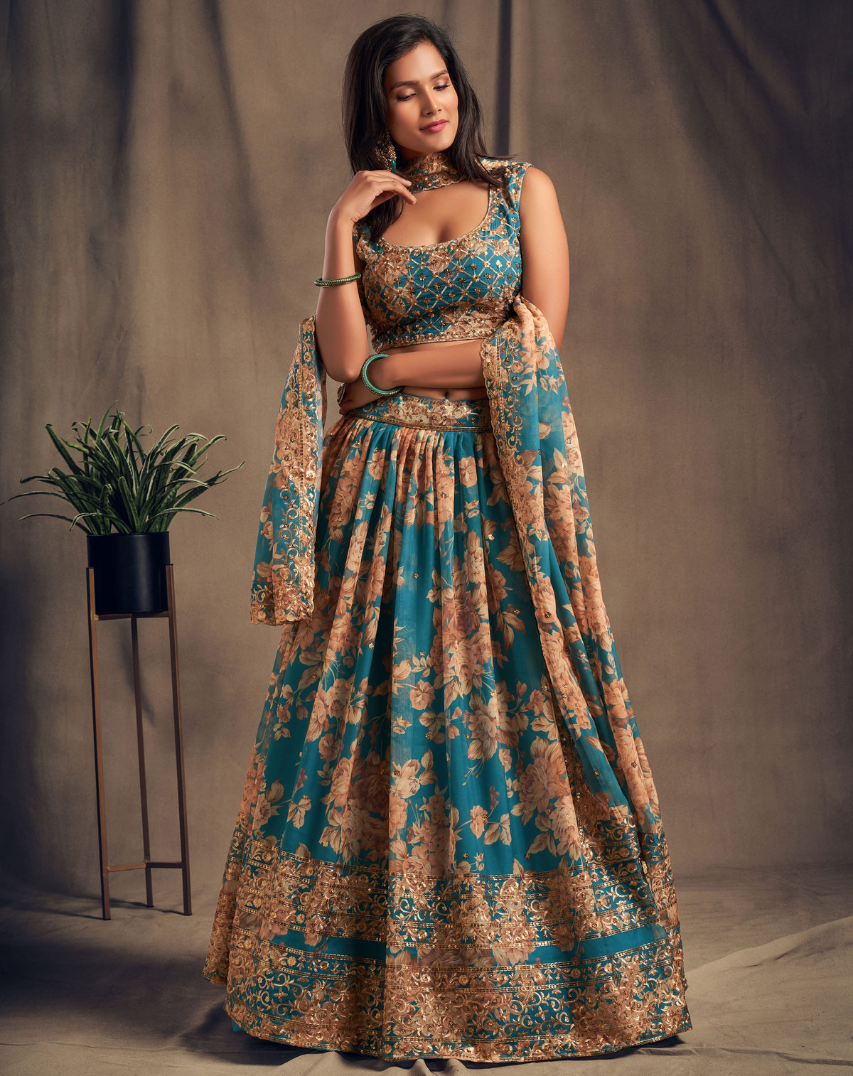 Teal Blue Floral Lehenga Choli with Golden Zari & Sequin Embroidery