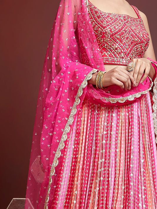 Rani Pink Bandhani Print Wedding Lehenga with Heavy Mirror Work Blouse & Net Dupatta