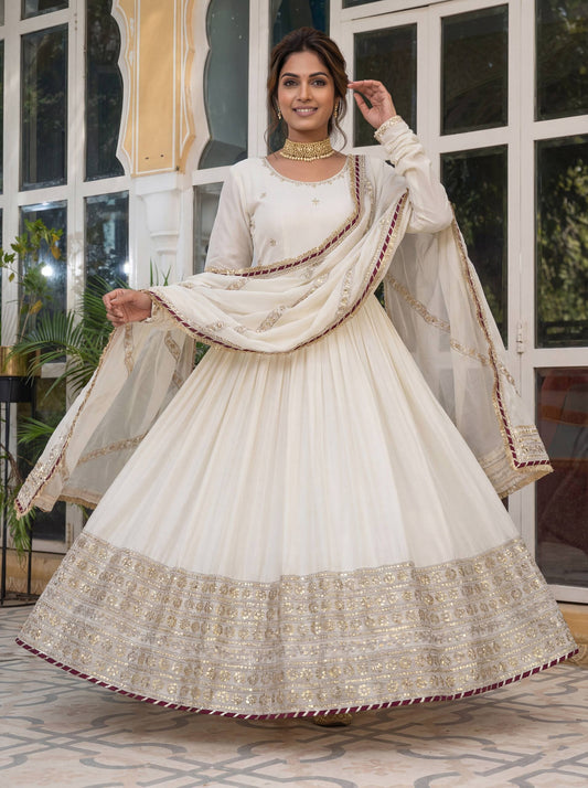 Elegant Off-White Silk Anarkali Dress with Heavy Golden Embroidery & Dupatta