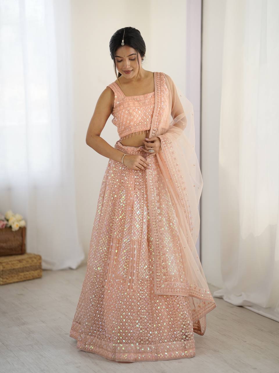 Elegant Peach Net Embroidered Lehenga Choli for Bridesmaids