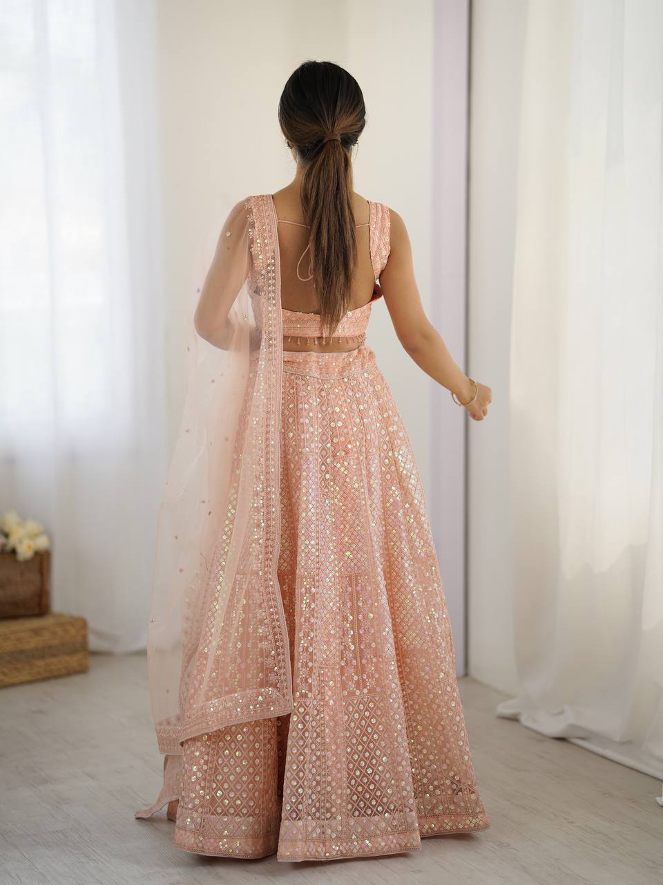 Elegant Peach Net Embroidered Lehenga Choli for Bridesmaids