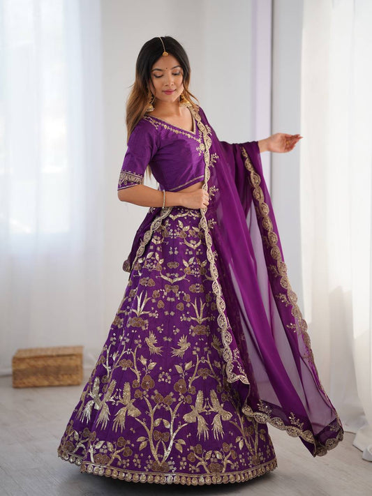Purple embroidered lehenga choli with golden zari work