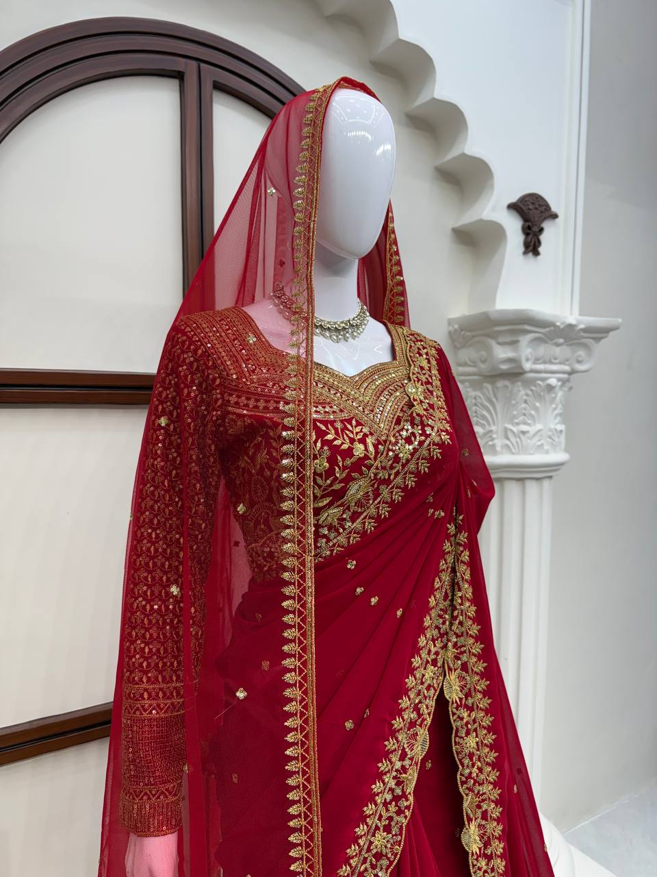 Deep Red Bridal Saree with Heavy Golden Floral Embroidery & Matching Sheer Veil